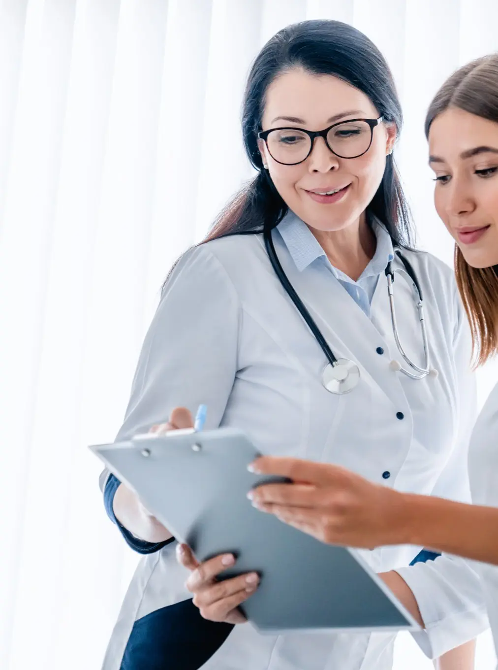 Fertility specialist with patient